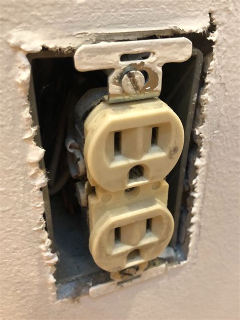 electrical outlet threaded hole